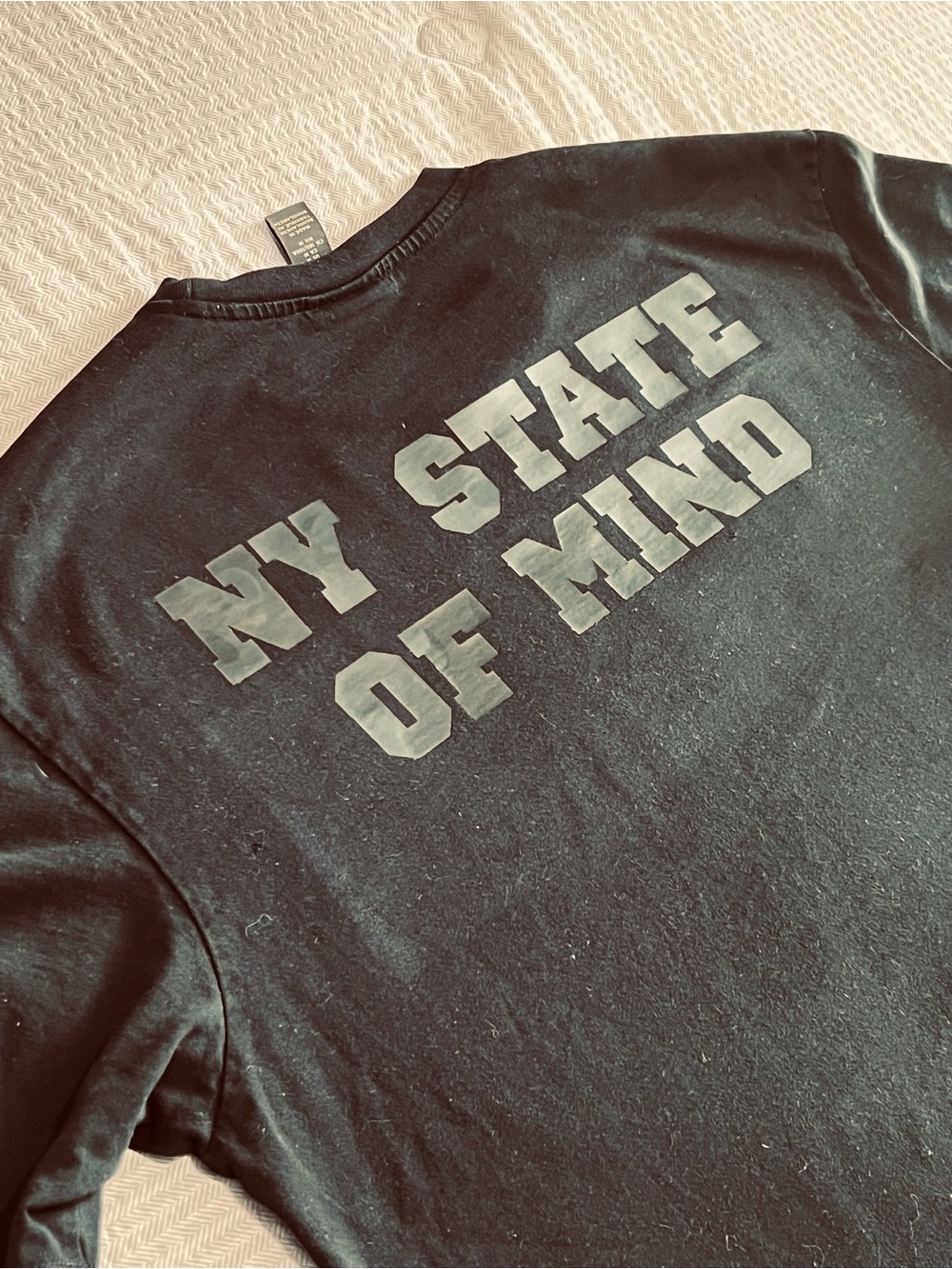 Upcyclcled Men's Black tee with hand stamped black letters with City Photo